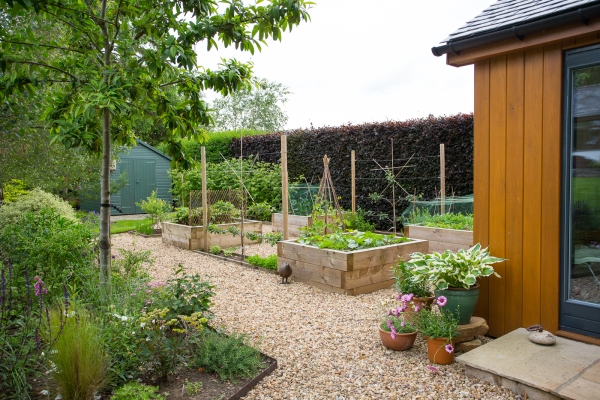 Polley Garden Design - a potager garden design by a summer house